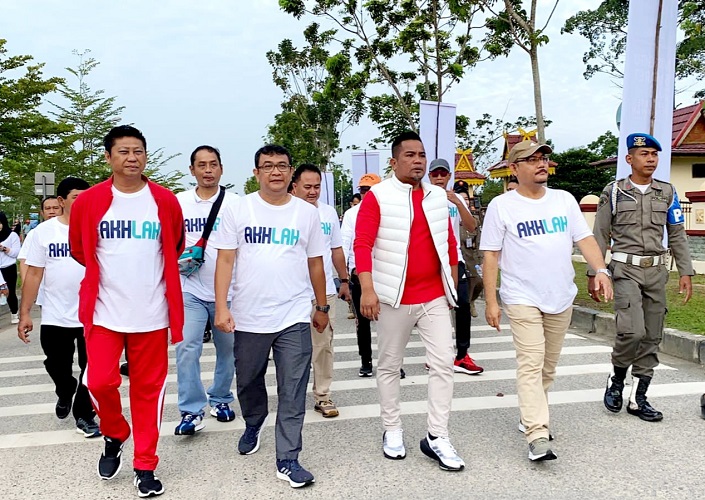 Bupati Pelalawan Hadiri Gerak Jalan Sehat Hari Ulang Tahun Ke