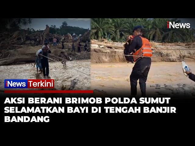 Aksi Heroik Anggota Brimob Polda Sumut Selamatkan Bayi di Tengah Banjir Bandang