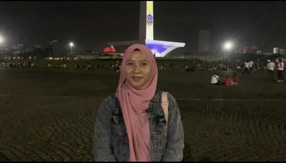 Antusiasnya Warga Sambut Tahun Baru di Monas meski Tanpa Kembang Api