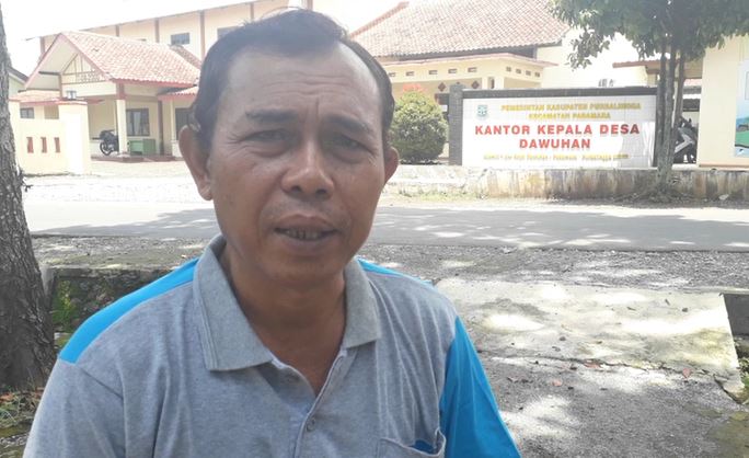 Kepada Desa Dawuhan Sujarwo Kepada Desa Dawuhan Sujarwo, Sabtu (15/2/2020) (Foto:iNews/Catur Edi)