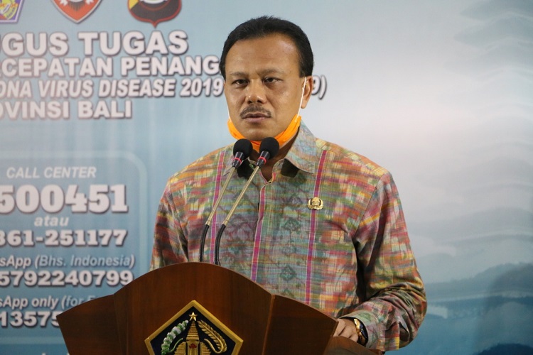 dewa made indra gugus tugas covid-19 bali Ketua Harian Gugus Tugas Covid-19 Bali Dewa Made Indra menyampaikan keterangan pers. (Foto: Humas Pemprov Bali)