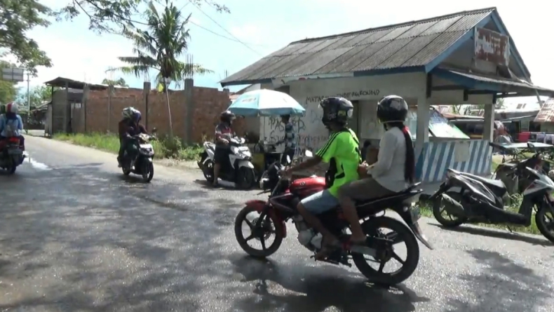 Lokasi begal Lokasi begal di Jakabaring, Palembang di depan pos polisi (Muhamamad David/iNews)