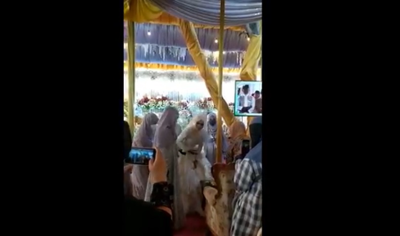 Pseta Pernikahan Jember Tangkapan layar pesta pernikahan di Pesantren Darul Arifin yang digelar saat PPKM Level 4.