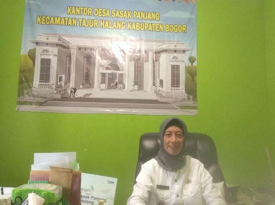 Kepala Desa Sasak Panjang, Kecamatan Tajur Halang, Kabupaten Bogor, Andy Umi Yulaikah MPd. (Foto: iNews.id)
