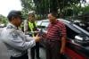 Pengemudi Taksi Online Terjaring Razia Gabungan - Bagian 8