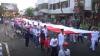 Dukung Pelantikan Jokowi, Warga Jombang Mengarak Bendera Merah Putih Sepanjang 50 Meter