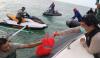 Naik Speedboat dan Jetski, Forkopimda Sulut Bagikan Sembako di Tengah Laut