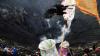 Warga Suku Tengger Gelar Ritual Yadnya Kasada di Kawah Gunung Bromo - Bagian 7