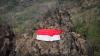 Tim SAR Kibarkan Bendera Merah Putih Raksasa di Bukit Gunung Sepikul Sukoharjo