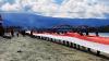 Bendera Merah Putih Sepanjang 1 Kilometer Dibentangkan di Pantai Hamadi Jayapura