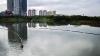 Antisipasi Banjir Jakarta, Lumpur Waduk Ria Rio Dikeruk - Bagian 2