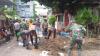 Kodim 1309 Manado Bantu Bersih-Bersih Sarana Umum Tertimbun Lumpur akibat Banjir