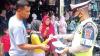 Tekan Penyebaran Covid di Aceh Barat, Polisi Bagi-Bagi Masker ke Pasar Meulaboh