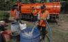 Pertamina Bersihkan Sumur Warga Terdampak Kebakaran Kilang Cilacap - Bagian 3