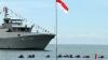 Pengibaran Bendera Merah Putih oleh Penyelam Gabungan dari Dalam Laut