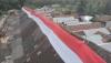 Bendera Merah Putih Sepanjang 168 Meter Dibentangkan di Atap Rumah Suku Dayak