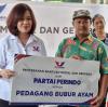 Partai Perindo Bagikan Gerobak untuk Pedagang Bubur Ayam dan Tahu Gejrot - Bagian 4