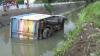 Diduga Sopir Ngantuk, Truk Muatan Saus Terguling ke Sungai Jombang