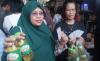 Terima 1.000 Minyak Goreng dari Caleg Partai Perindo, Warga Tanah Tinggi Merasa Terbantu