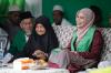 Demi Menghadiri Peringatan Isra Mikraj, Siti Atikoh Hujan-Hujanan ke Ponpes di Serang - Bagian 2
