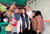 Perindo Gelar Bazar Murah, Warga Kramat Pela Berebut Foto Bareng HT dan Liliana