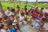 Aksi Sosial Wafer Tango Bagikan Telur Rebus ke Anak-anak Papua - Bagian 2