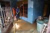 Potret Damkar Bantu Warga Rawajati Bersihkan Lumpur Pasca Banjir - Bagian 5