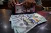 Rupiah Kembali Lesu, Ambles ke Rp16.828 per Dolar AS - Bagian 3