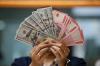 Rupiah Tembus Rp17.409 per Dolar AS - Bagian 1