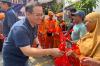 Senangnya Warga Pasar Minggu Dapat Daging Kurban dari BRI Area Warung Buncit