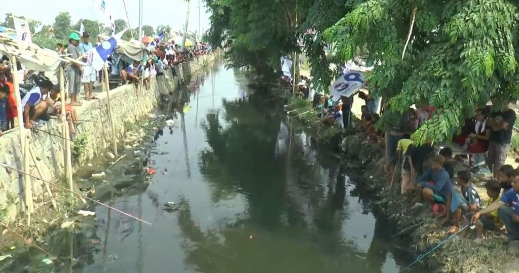 Perindo Bekasi Gelar Pesta Rakyat Mancing Gratis di Kali Rawasilem