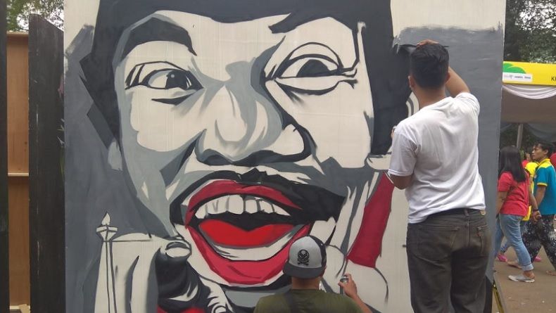 Wajah Bang Ben Ramaikan Lomba Mural Festival Pesona Lokal Jakarta