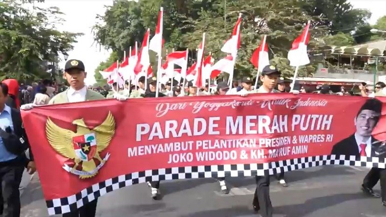 Sambut Pelantikan Jokowi-Ma'ruf, Ribuan Warga Yogya Gelar Parade Merah Putih di Malioboro
