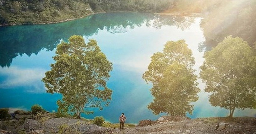 Terpikat Keindahan Danau Biru Sawahlunto, Terlihat Eksotis Dikelilingi Gunung Batu