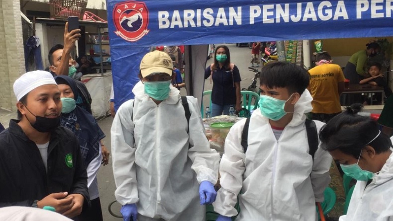 Baja Perindo Semprot Disinfektan Beberapa Titik Jakarta untuk Cegah Covid-19