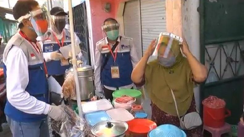 Cegah Penularan Covid-19 di Pasar, 1.500 APD Dibagikan Gratis ke Pedagang dan Pembeli