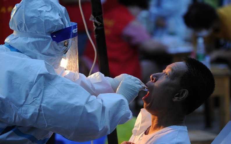 Terdapat Ratusan Kasus Infeksi Baru, China Hadapi Gelombang Ketiga Covid-19?