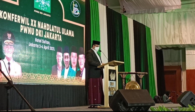 Pakai Peci dan Sarung, Anies Baswedan Hadiri Konferwil PWNU DKI