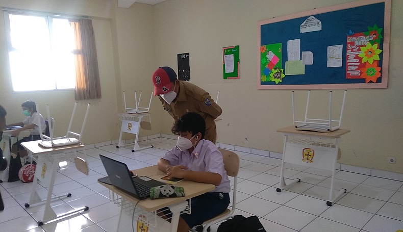 Jokowi Ingatkan Sekolah Tatap Muka Terapkan Protokol Kesehatan Ketat