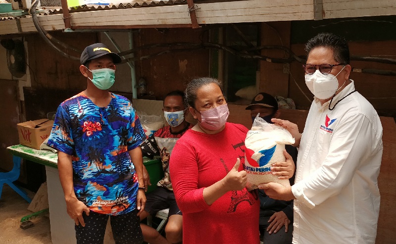 HUT ke-7, Perindo Gelar Bakti Sosial untuk Komunitas Masyarakat di Kolong Tol Pluit