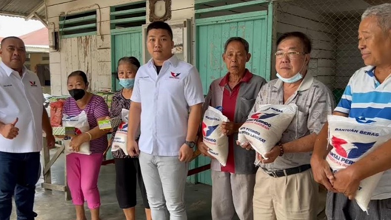 HUT Ke-7 Tahun, DPD Perindo Langkat Bagikan 100 Paket Sembako ke Warga Kurang Mampu