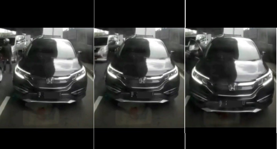 Viral Pengendara Mobil Dijambret saat Asyik Main HP di Jalan Macet, Netizen: Kenapa Kaca Dibuka?