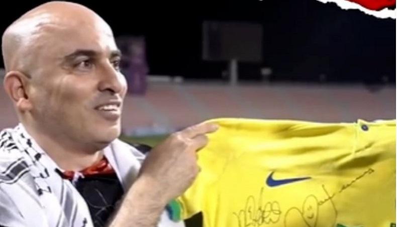 Viral, Video Pria dengan Bendera Palestina Bantu Gendong Cucu Pelatih Timnas Brasil