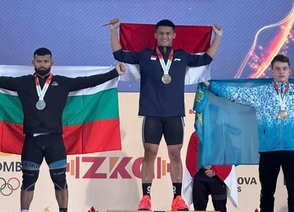 Mantap! Lifter Indonesia Rizki Juniansyah Raih Emas di Kejuaraan Dunia IWF Kolombia 2022