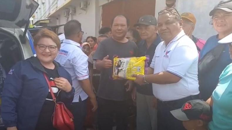 Baksos Partai Perindo Sulut, Bagikan Beras untuk Sopir Angkot di Terminal Amurang