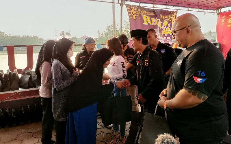 Baja Partai Perindo dan Caleg Kota Depok Bersama FKP Gelar Santunan Anak Yatim dan Janda di Situ Rawa Besar