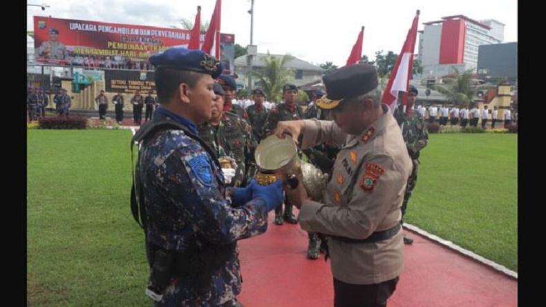 Kapolda Sulut Pimpin Tradisi Penyerahan Air Suci, Diambil dari Watu Pinawetengan