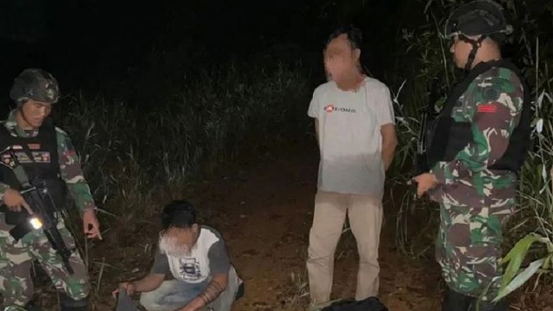 Dengar Suara Berbisik saat Subuh, TNI Temukan 2 Orang di Semak-Semak Perbatasan Malaysia