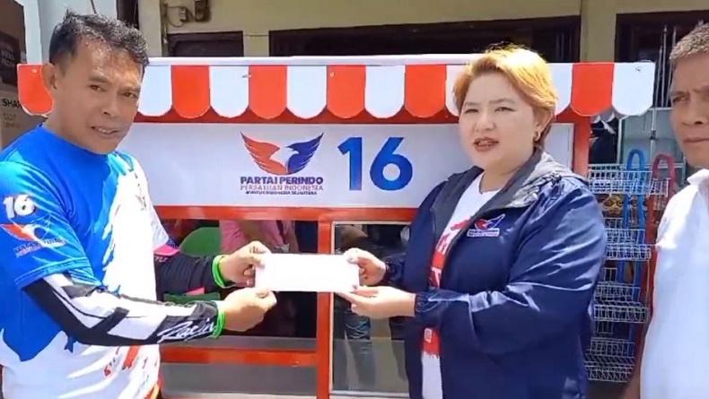 DPW Partai Perindo Sulut Bagikan Gerobak dan Modal Usaha untuk Pelaku UMKM di Bolmong