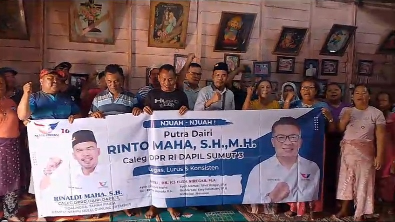 Bacaleg Partai Perindo Rinto Maha Bagikan KTA Berasuransi di Kabupaten Dairi Sumut